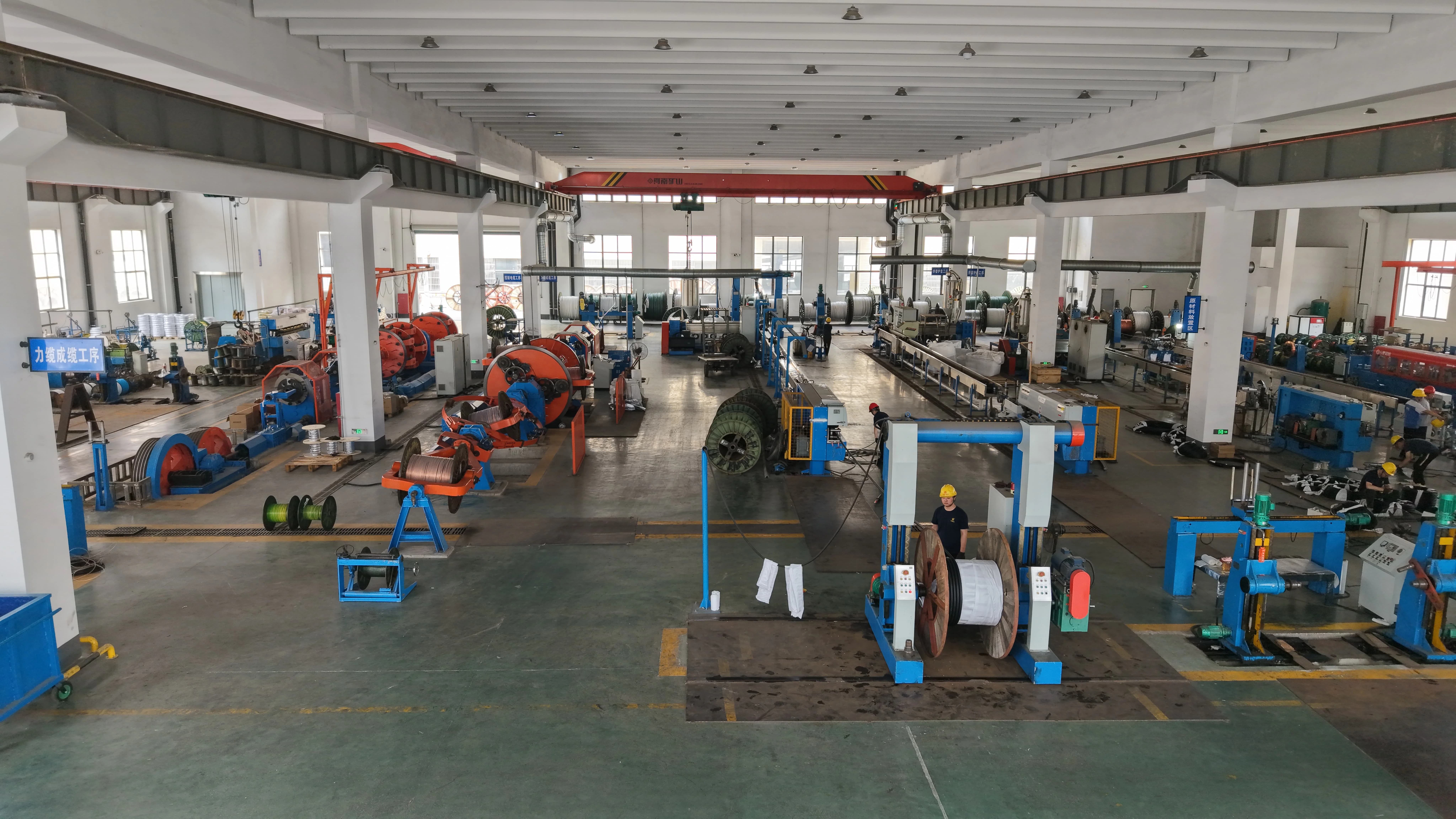 Modern cable manufacturing workshop and automated cabling production line at Zhejiang Hongce Cable Co., Ltd.